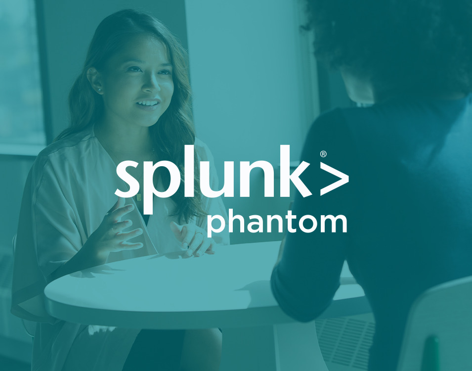 A blue overlay and the logo of RadarFirst partner Splunk Phantom, appear over an image of two young professionals meeting and amicably exchanging ideas. | RadarFirst